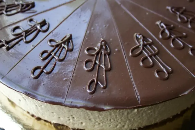 Bittersweet mocha mousse cake with piped chocolate